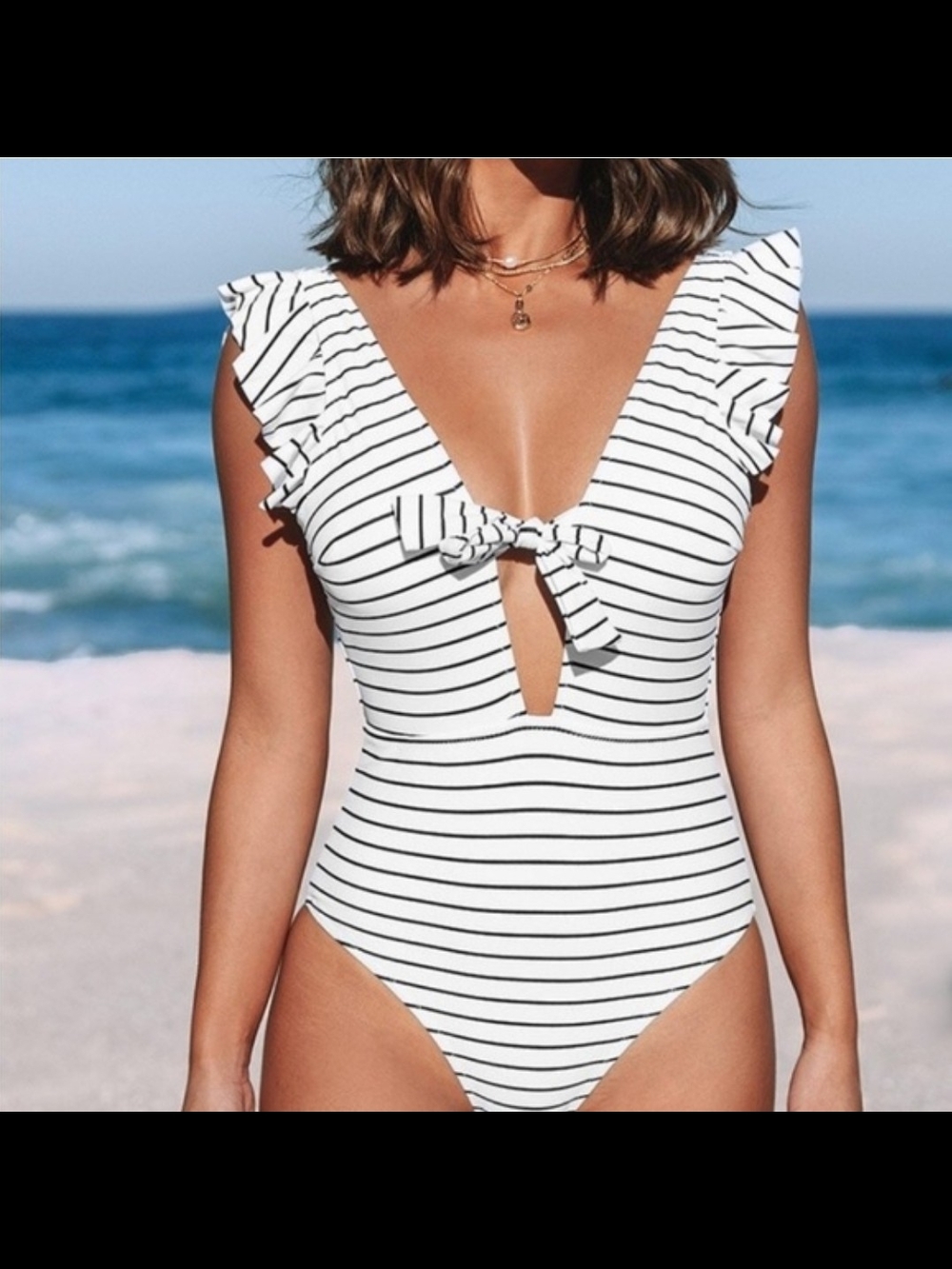 Cupshe White and Black Striped Ruffle One-Piece Swimsuit with Front Tie